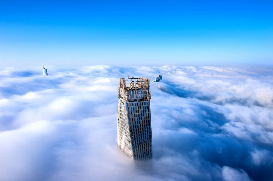 Dubai city above the clouds 1